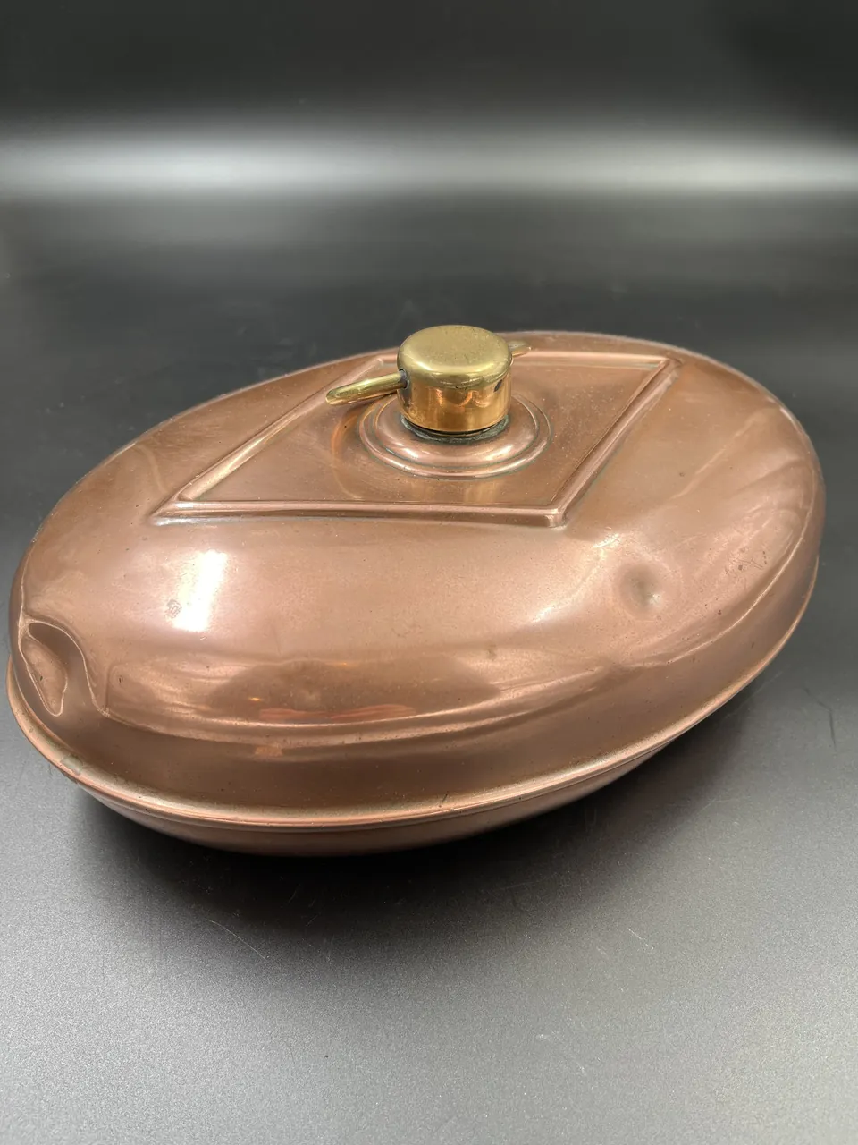 Oval copper foot warmer
